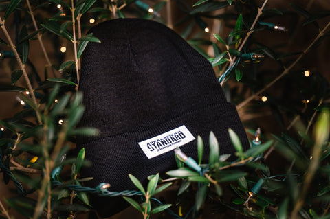 Black Beanie Hat with Appalachian Standard in a bush
