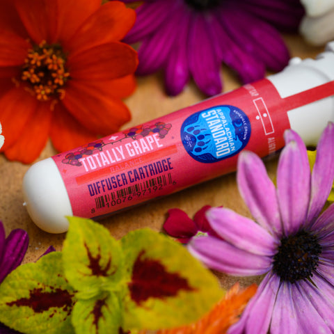 Totally Grape vape in a sustainable Sana tube on a bed of flowers by Appalachian Standard