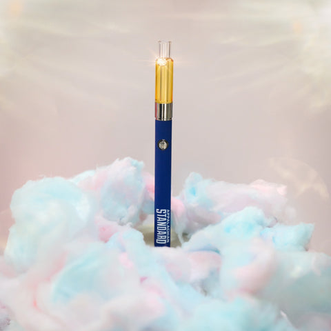 Appalachian Standard's Cotton Candy CBD Vape surrounded by blue and pink cotton candy