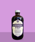 Brew Naturals Elderberry syrup on a purple background