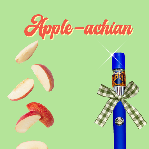 Blue pen with a checkered bow surrounded by apple slices on a green background with 'Apple-achian' text.