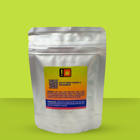 Orange gummy bag on a green backdrop 