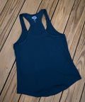 Blue tank top on a wooden surface