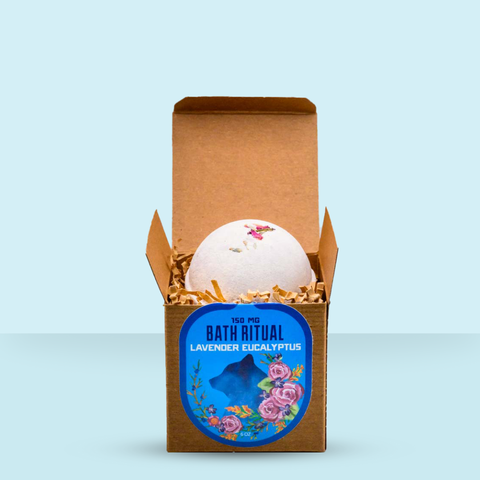 Appalachian Standard Lavender Eucalyptus Bath Bomb in a cardboard box with a blue label on a light blue background