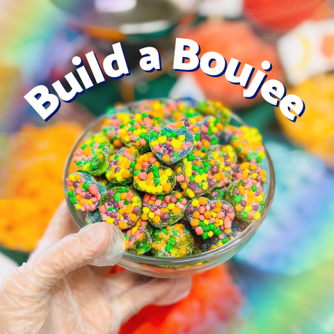 Hand holding a bowl of colorful candy with 'Build a Boujee' text overlay.