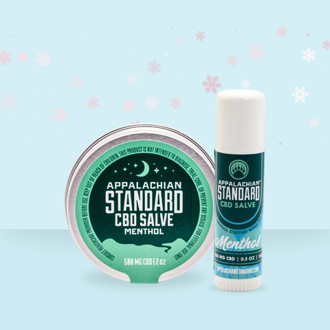 Appalachian Standard CBD Salve Menthol packaging on a light blue background with snowflake decorations.