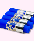 Set of blue and silver cylindrical containers with paw print design on a light background for Appalachian Standard's Strawberries n' Cream THC Vapes.