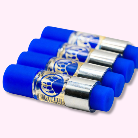 Set of blue and silver cylindrical containers with paw print design on a light background for Appalachian Standard's Strawberries n' Cream THC Vapes.