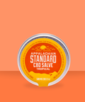 Appalachian Standard's Tropical CBD Salve on an orange background.