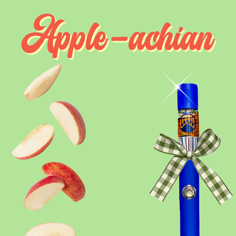 Blue product with a bow and sliced apples on a green background for Appalachian Standard's Apple-achian CBD vapes.