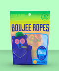Packaging of Boujee Ropes with a colorful design on a green background