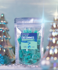 Packaged CBD gummies with a blue label against a festive background
