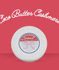 Appalachian Standard's Coco Butter Cashmere CBD body cream on a red background