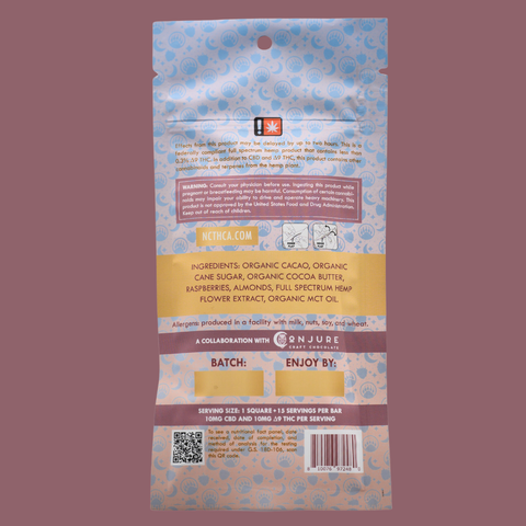 Back of a Appalachian Standard's Raspberry Almond THC Chocolate package with text and QR code on a pink background