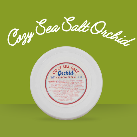 Appalachian Standard's Cozy Sea Salt Orchid CBD body cream on a green background