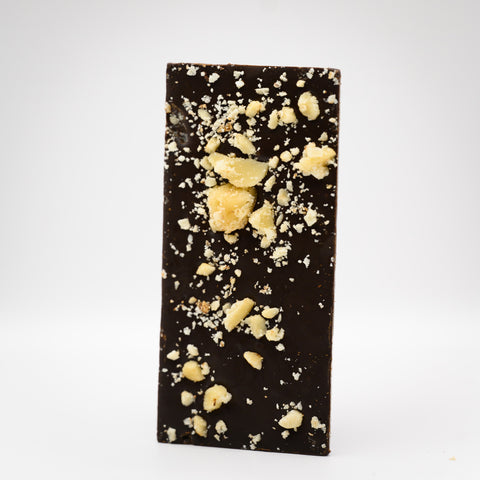 A photo of Appalachian Standards new Caramel Macchiato CBD Chocolate bar with chunky toffee pieces.