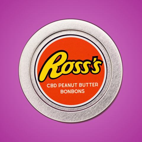 Appalachian Standard's limited edition Ross's CBD Peanut Butter BonBons tin lid with an orange label