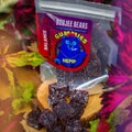 A bag and pieces of Appalachian Standard's Boujee Bears Elderberry CBD Gummies on a small round wooden platter