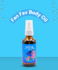 Bottle of 'Fan Fav Body Oil' with a blue label on a blue background