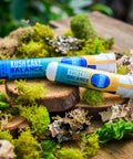 Kush Cake Pre-Rolls in sustainable sana tubes on wood and moss from Appalachian Standard