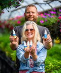 Appalachian Standard owners hold 1 oz bottles of tinctures from the CBD Tincture Trio Bundle