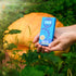 Cupped hands hold Appalachian Standard's Pumpkin Spice Latte CBD Vape kit with a pumpkin in the background