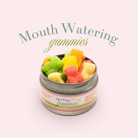 Jar of colorful gummies with 'Mouth Watering gummies' text on a light background