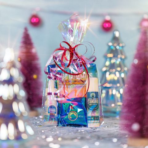 Gift bag with products on a festive background