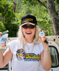 Woman holding Sugar Daddies Altitude Adjusting Gummies packages outdoors - Appalachian Standards new product launch
