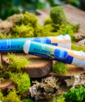 T1  pre-rolls in sustainable recycled ocean plastic tubes on wood and moss from Appalachian Standard