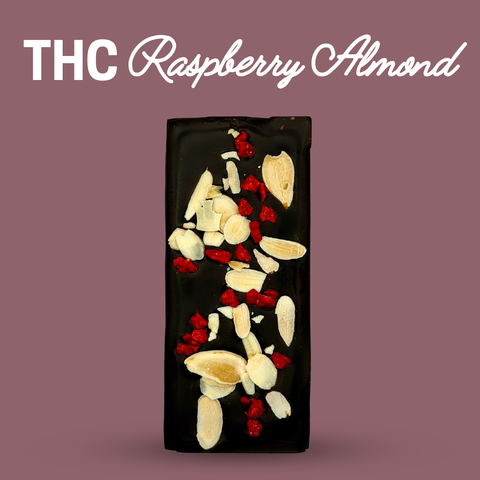 Dark chocolate bar with raspberry and almond pieces on a purple background, labeled 'THC Raspberry Almond'.