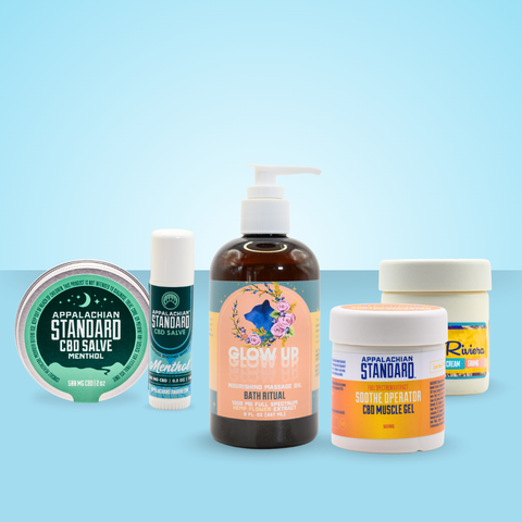 Collection of Appalachian Standard CBD products on a light blue background