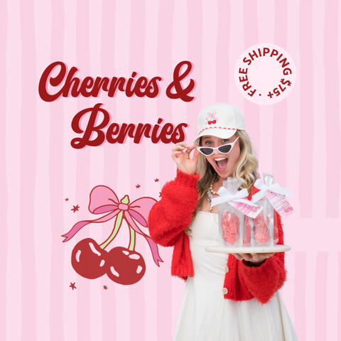 Cherries & Berries product promotional image featuring a cheerful woman holding a gift-wrapped candy bundle, with a cherry illustration and free shipping badge.