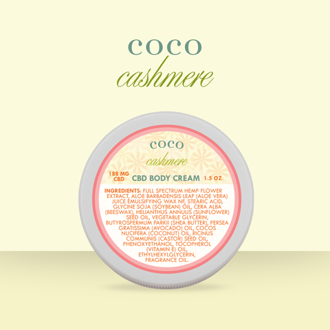 Appalachian Standard Coco Cashmere CBD Body Cream tin, 188mg, 1.5 oz, displayed on a soft yellow background. The round tin features a cream and coral label with a daisy pattern.