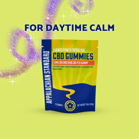 Flower Power gummies in a yellow package with purple swirl on green/yellow background.