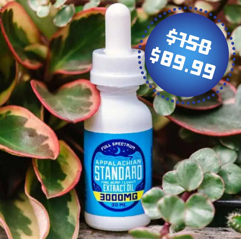 A 1 oz bottle of Appalachian Standard's Balance Extra Strength CBD Tincture surrounded by plants