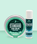 Two containers of Appalachian Standard CBD Salve, one as a tin container and the other as a stick, both labeled with 'Menthol' and containing 500 mg CBD each.